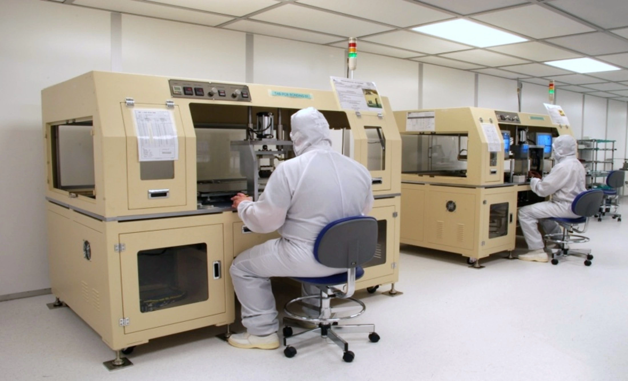 Lotus cleanroom interior with gowned technicians