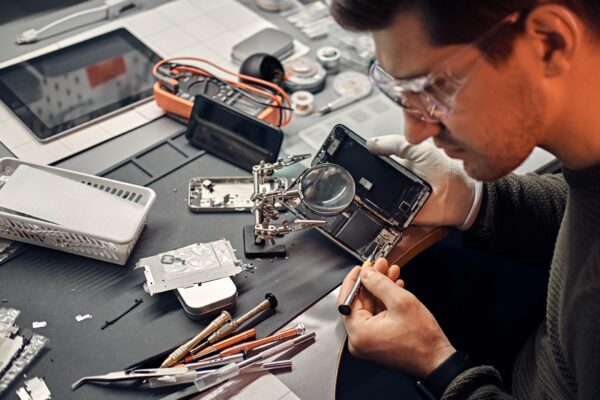 man-repairing-electronics-us-returns